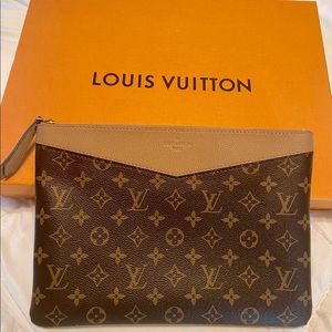 LV Daily Pouch. Like new, only used 3x.